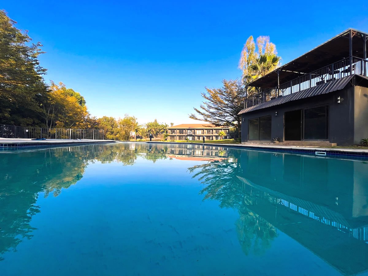 The swimming pool and guest-room blocks at Royal Solwezi Hotel