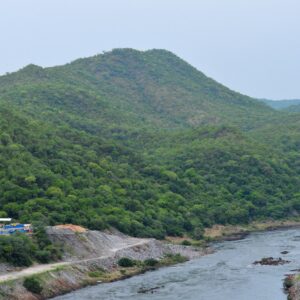 Green hills falling to the Zambezi gorge at Siavonga, Zambia, below the Kariba Dam wall. Context photograph of the area around Lake Kariba Inns, not of the property itself.