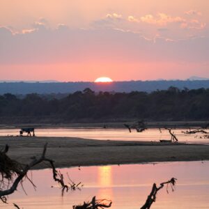 Sunset over the Luangwa River in South Luangwa National Park. Context photograph of the area around Marula Lodge, not of the property itself.