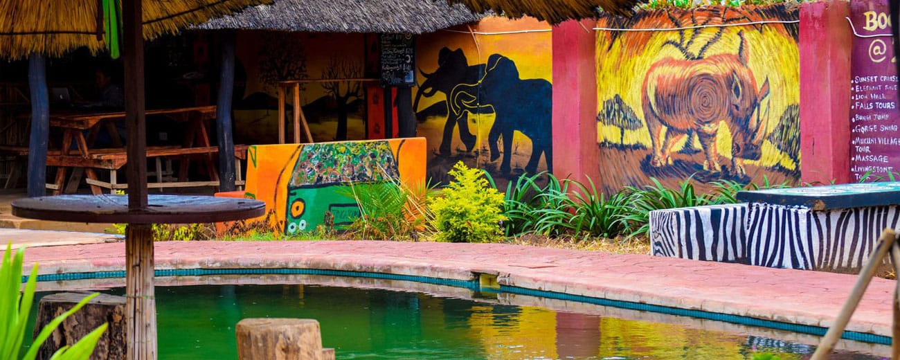 Accommodation buildings at Zinga Backpackers in Livingstone, Zambia.